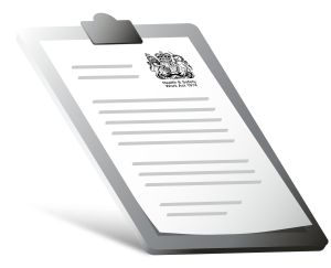 Clipboard holding a document titled "Health & Safety Work Act 1974," featuring a royal crest at the top.